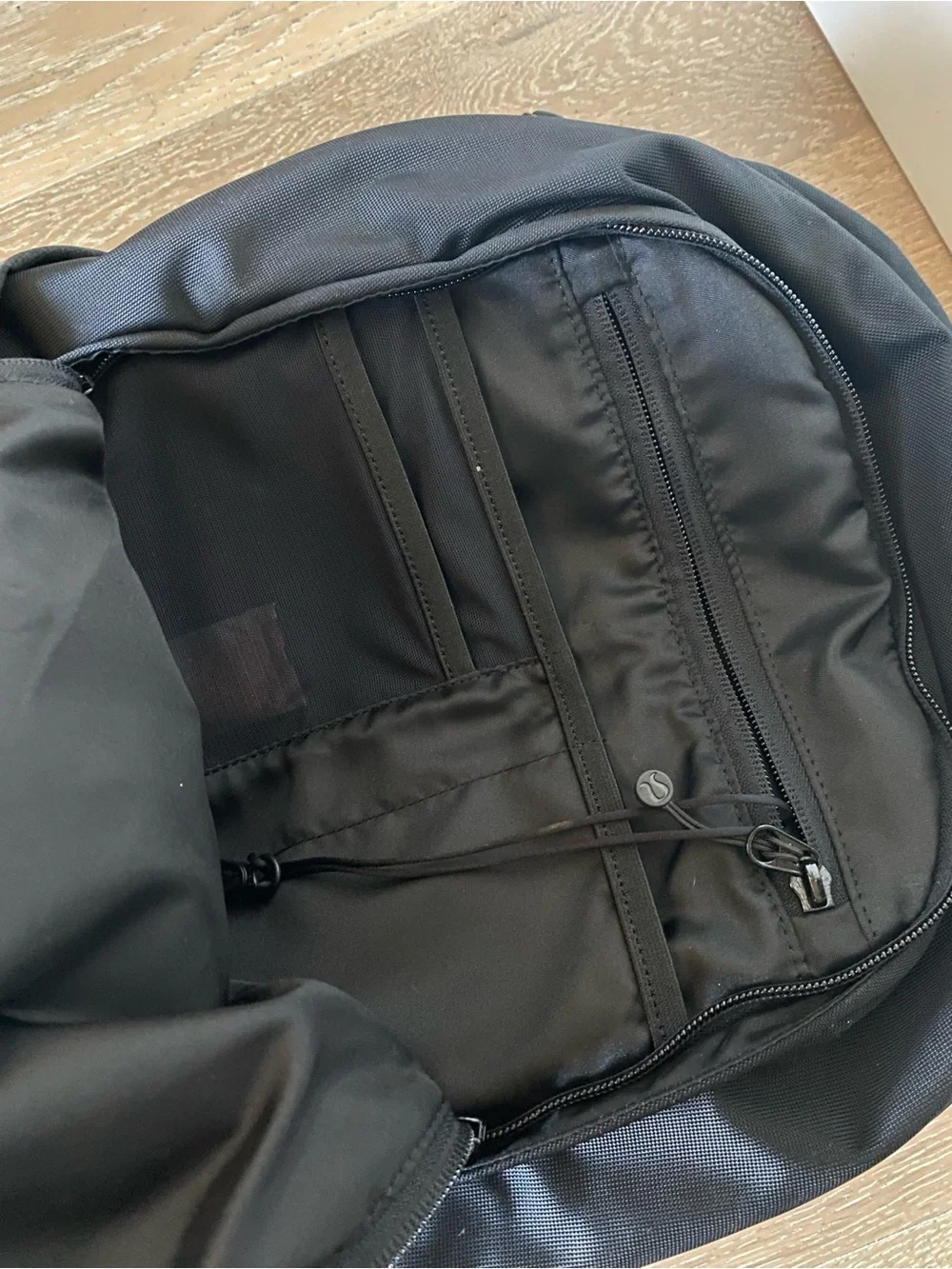 Lululemon Black Backpack 20L reflective detail & lumbar support water repellent